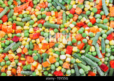 Un cocktail di congelati verdure tritate close-up come sfondo Foto Stock