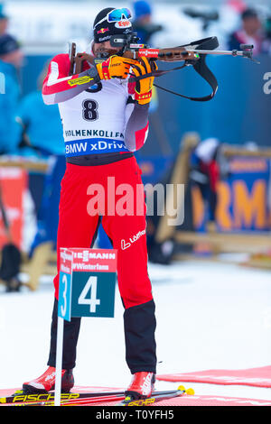 Oslo, Norvegia. 22 Mar, 2019. BMW IBU Coppa del Mondo di Biathlon. 22 marzo 2019 Dominik Landertinger dell'Austria compete in uomini 10km sprint durante la BMW IBU Coppa del Mondo di Biathlon a Holmenkollen a Oslo, Norvegia. Credito: Nigel Waldron/Alamy Live News Foto Stock