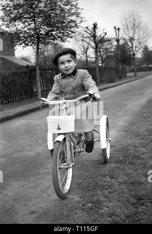Bambino di equitazione Winkie Raleigh giocattolo triciclo trike la Gran Bretagna degli anni cinquanta Foto Stock