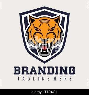 Tiger ruggito Logo con la protezione Illustrazione Vettoriale