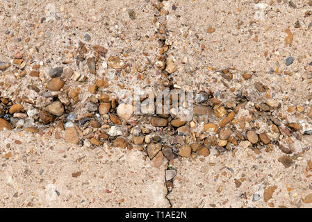 Calcestruzzo eroso con aggregato esposto sul muro di mare in Galveston Texas USA Foto Stock