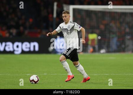 Amsterdam, Paesi Bassi. 25 Mar, 2019. firo: 24.03.2019, Calcio, National Team Germany, UEFA, qualificazioni del Campionato Europeo 2010, Campionato Europeo qualifica 2020, Paesi Bassi, Olanda - GER, Germania 2: 3 Giosuè KIMMICH, GER, singola azione | Utilizzo di credito in tutto il mondo: dpa/Alamy Live News Foto Stock