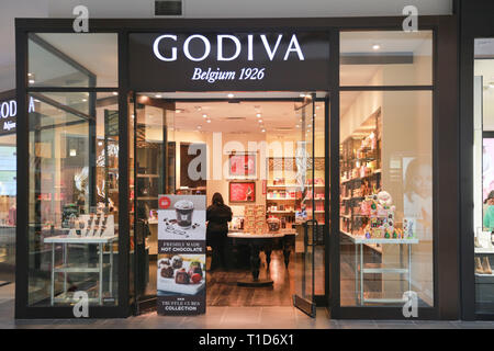 Lawrence Township New Jersey, febbraio 24, 2019:Godiva negozio di fronte al ponte di Quaker mall.. Godiva Chocolatier è un produttore di cioccolatini premium Foto Stock