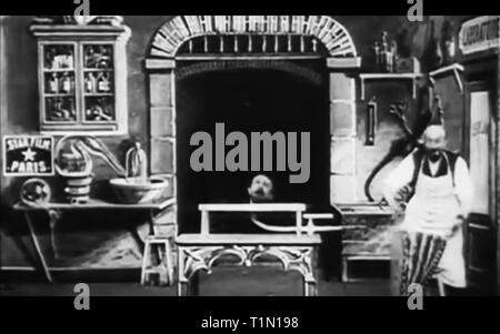 Il gonfiaggio di un uomo di testa vintage Foto Stock