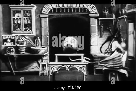 Il gonfiaggio di un uomo di testa vintage Foto Stock