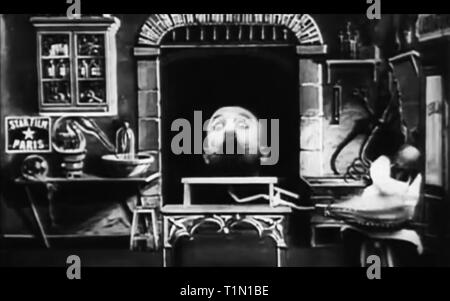 Il gonfiaggio di un uomo di testa vintage Foto Stock