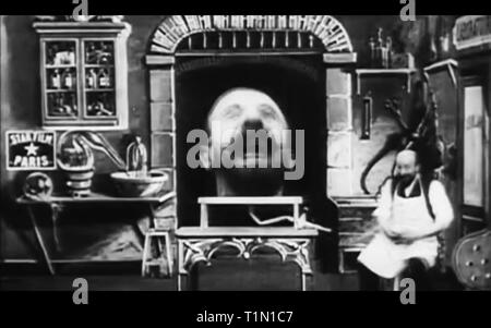 Il gonfiaggio di un uomo di testa vintage Foto Stock