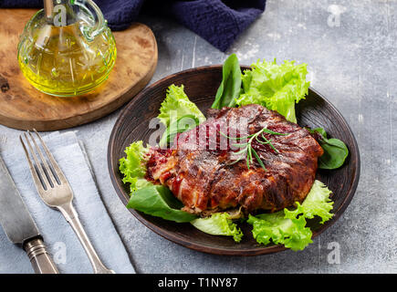 Pancetta avvolto bistecca Foto Stock