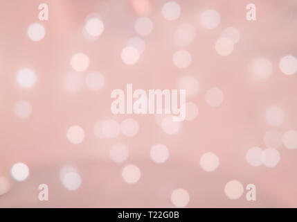 Bokeh luci festive defocussed texture di sfondo virati al colore trend coralli viventi. Foto Stock