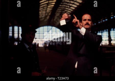 In senso orario (1986) John Cleese, Data: 1986 Foto Stock