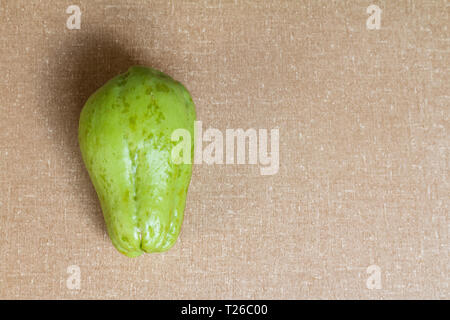 Chayote con sfondo a trama. Foto Stock