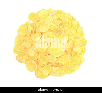 Un mucchio di corn flakes isolato su sfondo bianco.Vista dall'alto. Foto Stock