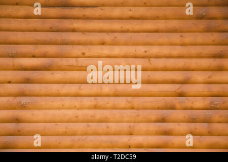 Big Brown asse di legno muro sfondo texture. Foto Stock