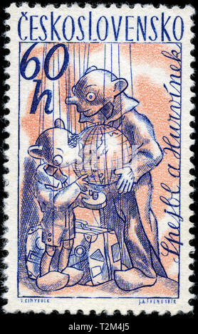 Francobollo dalla Cecoslovacchia in cecoslovacco serie Marionette rilasciato in 1961 Foto Stock