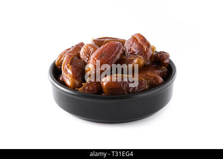 Date in nero ciotola isolato su sfondo bianco. Foto Stock
