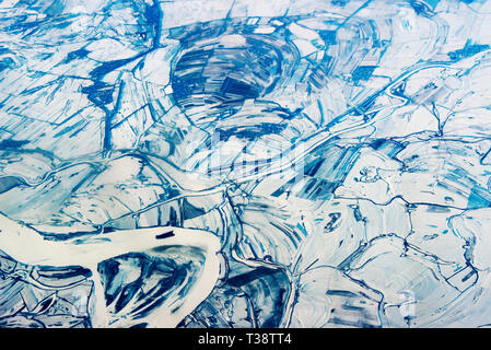 Aerial view of land and Songhua River covered by ice, northeast China Foto Stock