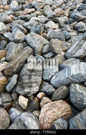 Gneiss rock - sullo sfondo di un comune e diffuso tipo di roccia metamorfica. Foto Stock