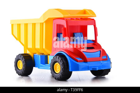 In plastica colorata carrello toy isolato su bianco. Foto Stock