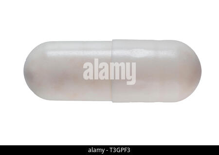 Macro estremo colpo di una pillola capsule che mostra la struttura del materiale. Foto Stock