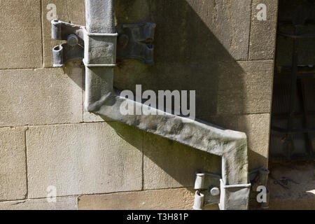 Antica drainpipe di piombo sul Corpus Christi College di Oxford Foto Stock