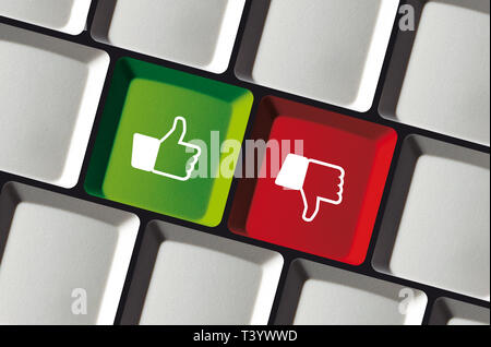 Come antipatia - Thumbs up, pollice in giù le icone - Tastiera con due tasti colorati, verde e rosso Foto Stock