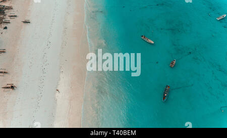 Di pescatori in dhow stone town Zanzibar Foto Stock