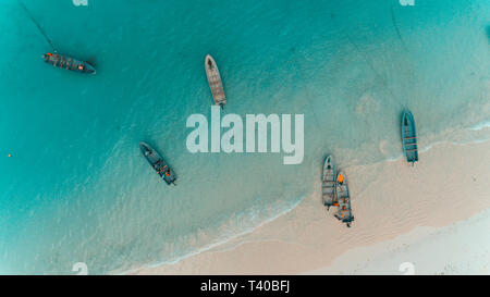 Di pescatori in dhow stone town Zanzibar Foto Stock