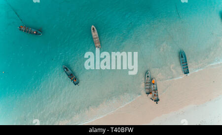 Di pescatori in dhow stone town Zanzibar Foto Stock