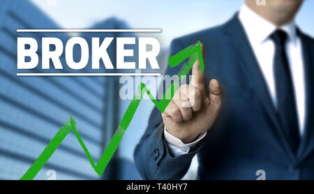 Broker concetto è illustrato da parte dell'imprenditore. Foto Stock