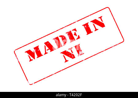 Timbro di gomma concetto mostra un francobollo rosso la lettura fatta in NI Foto Stock