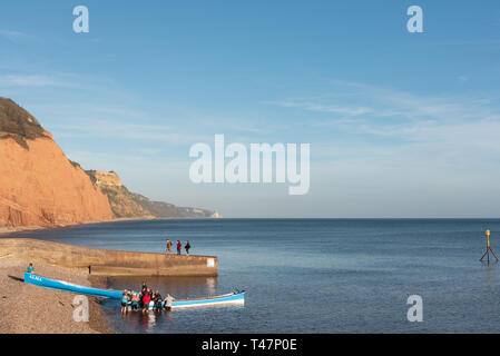 Gig pilota barche a remi a Sidmouth Foto Stock