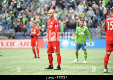 Seattle, Washington, Stati Uniti d'America. Xiii Apr, 2019. Toronto è Michael Bradley (4) guarda come Toronto FC visiti le sirene di Seattle per un match di MLS al secolo campo Collegamento a Seattle, WA. Credito: Jeff Halstead/ZUMA filo/Alamy Live News Foto Stock