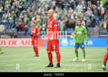 Seattle, Washington, Stati Uniti d'America. Xiii Apr, 2019. Toronto è Michael Bradley (4) guarda come Toronto FC visiti le sirene di Seattle per un match di MLS al secolo campo Collegamento a Seattle, WA. Credito: Jeff Halstead/ZUMA filo/Alamy Live News Foto Stock