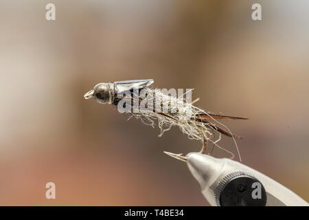 Fly fishinig, Costruzione mosche ganci close up Foto Stock