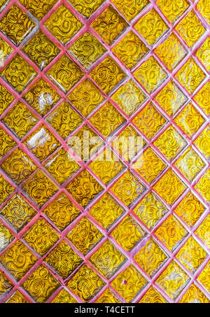 Modello di tailandese tradizionale decorare sulla parete del tempio Foto Stock