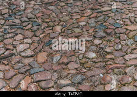 Colorata antica pavimentazione in pietra Foto Stock