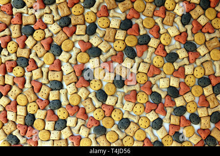 Texture di sfondo di vari biscotti di cane Foto Stock