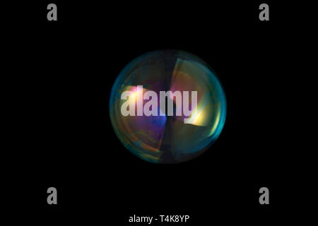 Bolle di zuppa isolati su sfondo nero Foto Stock