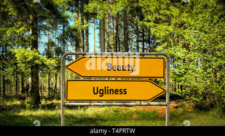 Strada segno bellezza contro bruttezza Foto Stock