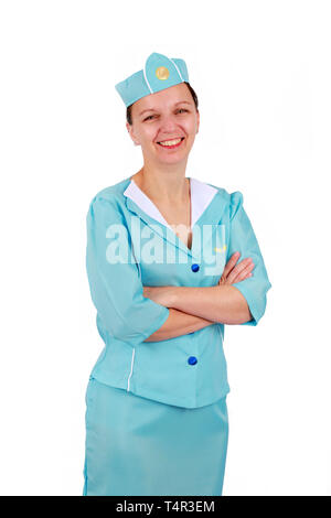 Stewardesse - Charming e sorridenti hostess che indossa in uniforme blu. Isolato su sfondo bianco Foto Stock