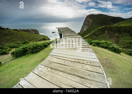 Muelle de las ánimas, Pirulil, costa occidental de la Isla Grande de Chiloé ,provincia de Chiloé ,Región de Los Lagos,Patagonia, República de Chile,América Del Sur. Foto Stock