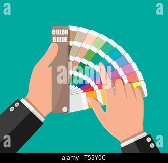 Campione di colore. Tavolozza dei colori guida in mano. Scala colorata. Rainbow strumento per designer, fotografo, artista. I campioni di colore catalogo, prenota, pantone Illustrazione Vettoriale