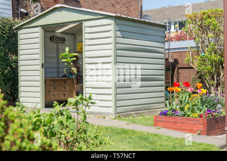 Un quadro chiaro di un giardino inglese. Foto Stock