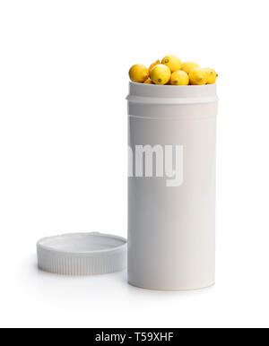 Scambiare le vostre pillole ad un limoni freschi. Concetto di natura fatta integratore vitaminico da frutti naturali Foto Stock