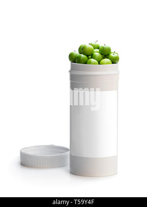 Scambiare le vostre pillole per una fresca mela verde. Concetto di natura fatta integratore vitaminico da frutti naturali Foto Stock