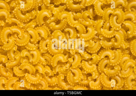 Creste di gallo pasta - giallo sfondo astratto Foto Stock