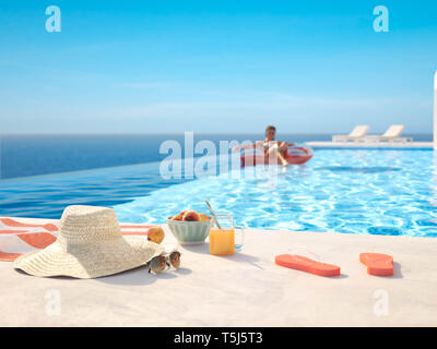 3D-illustrazione. lusso moderno piscina infinity con estate accessoires Foto Stock