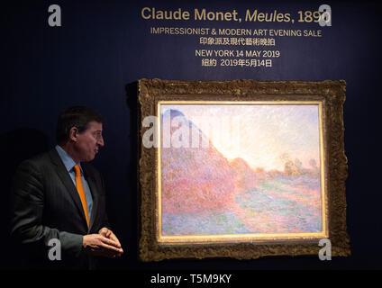 Hong Kong, . 26 apr, 2019. Agosto Uribe, testa di Sotheby's & impressionista Galleria di Arte Moderna di New York è a portata di mano per introdurre il Claude Monet 'Meules'' sul display in Hong Kong. SOTHEBY'S è quello di offrire una icona della pittura impressionista in vendita nella loro New York vendita il 14 maggio 2019. Meules da 1890 è uno di Claude Monet della famosa serie Haystacks. Credito: Jayne Russell/ZUMA filo/Alamy Live News Foto Stock