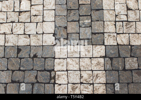 Carreggiata di pietra dalla zona di granito in Praga. Foto Stock