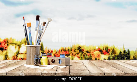 Pulire pennelli con varie vernici di colore su un vecchio tavolo di legno con la natura in background, il concetto di pittura in natura, rendering 3D Foto Stock